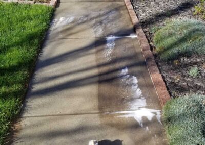 Sidewalk before and after pressure washing